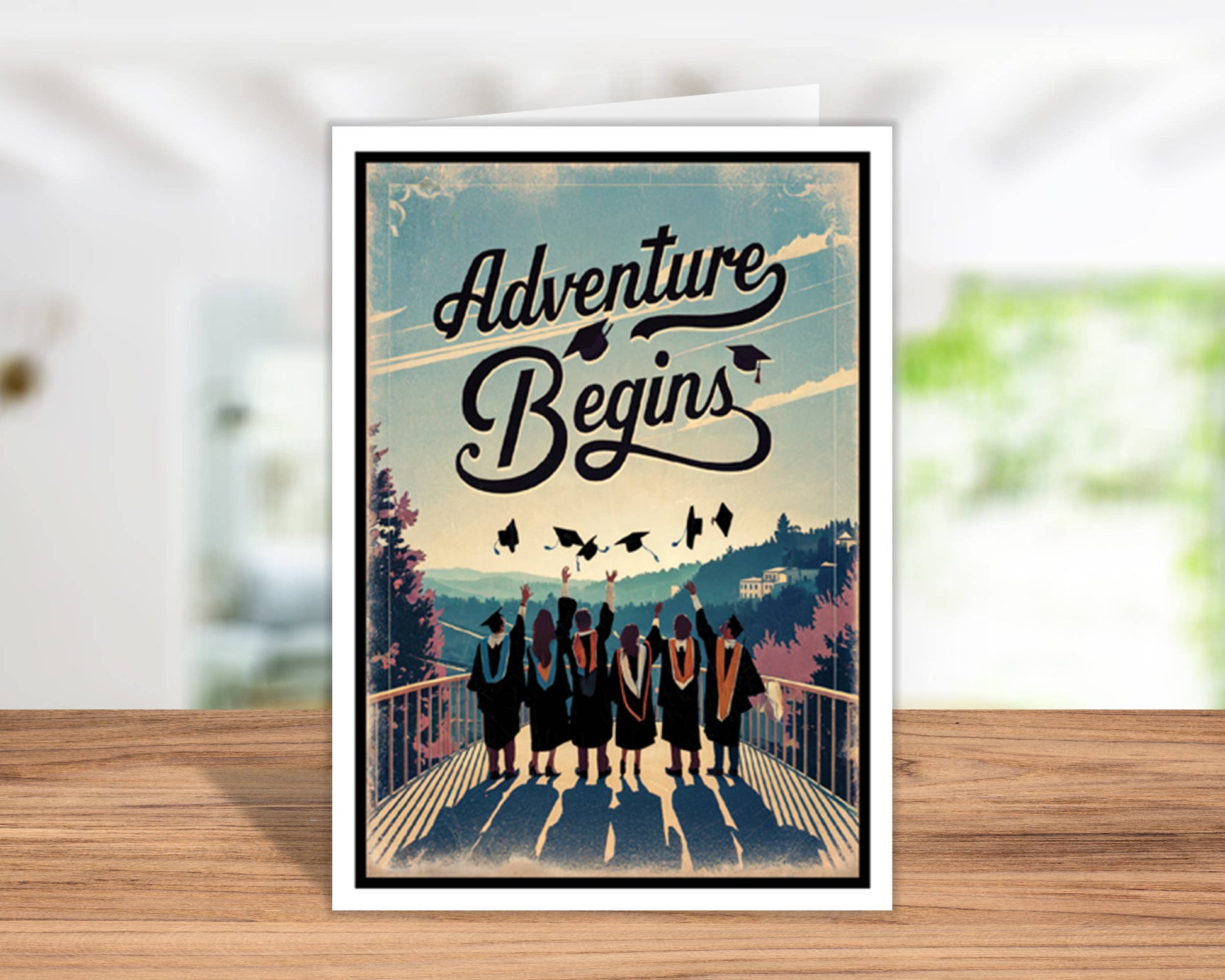 Framed poster with 'Adventure Begins' text and silhouette of people on a bridge.