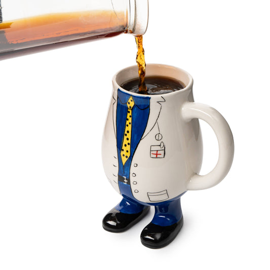 Mug with cartoon design of a person pouring coffee