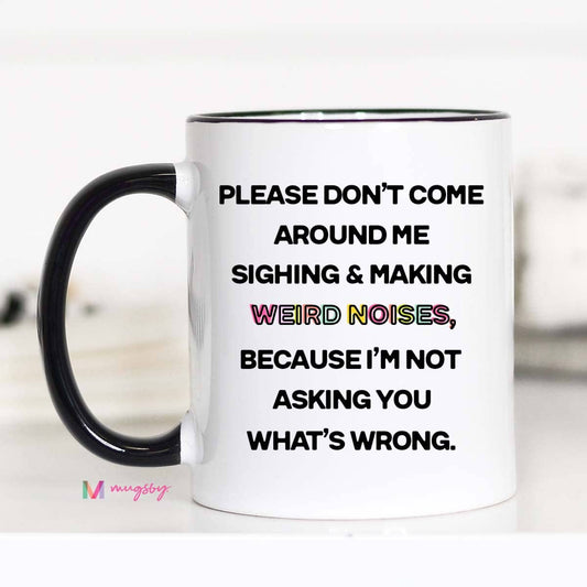 White mug with black text and handle on a white background