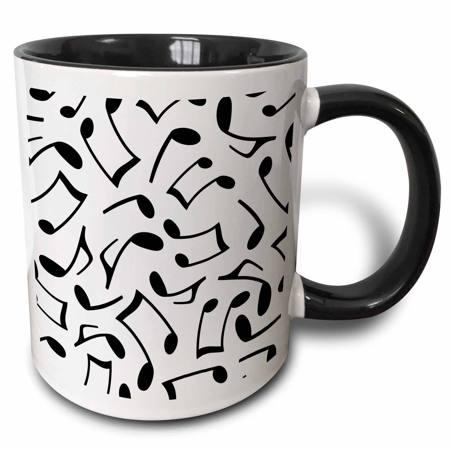 White mug with black interior and handle, featuring musical symbols in black on white