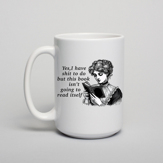 White mug with black text and illustration of a woman reading a book on a light gray background