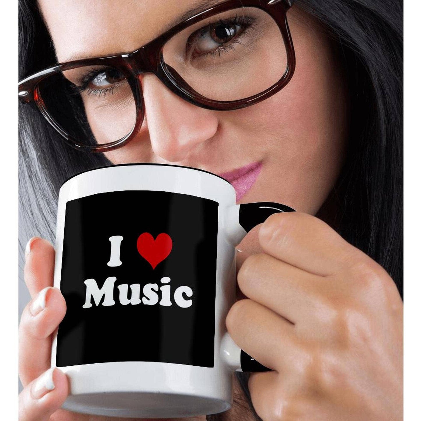 Person holding a mug with 'I ❤️ Music' text