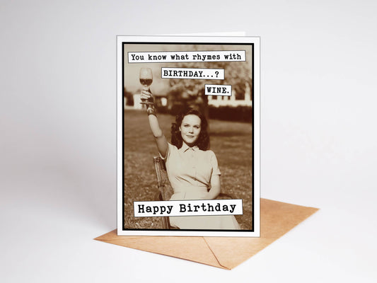 Birthday card with vintage photo of a woman holding a glass of wine and humorous text.
