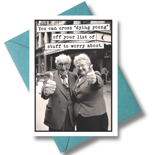 Card with black and white photo of two elderly people giving thumbs up, text overlay, and teal envelope.